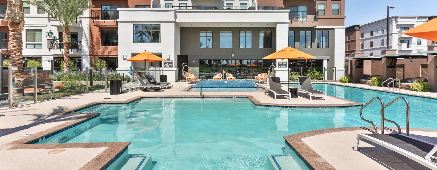 a pool in front of a building