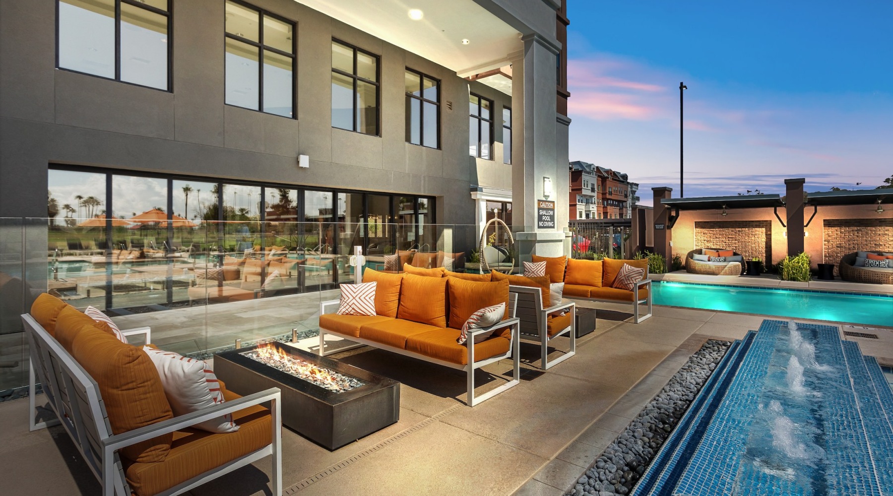 Love where you live Poolside lounge area with couches